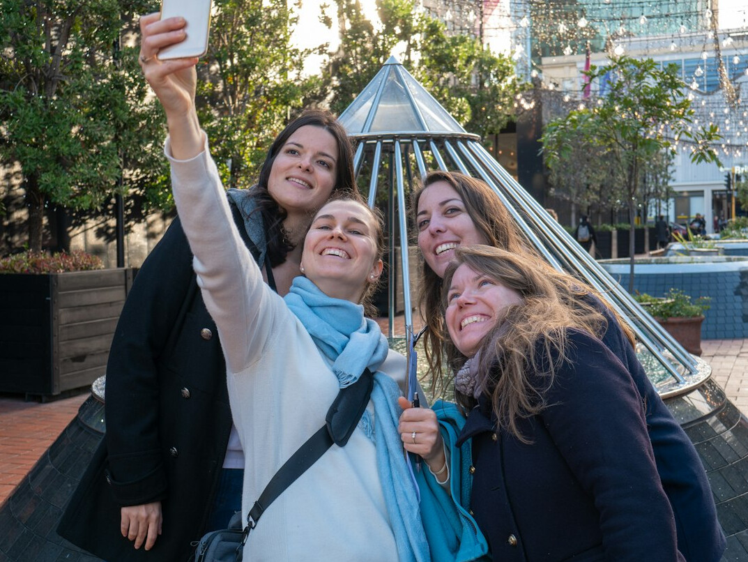 Team celebrating a successful software project launch